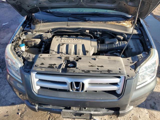 Photo 12 from auction – 2006 HONDA PILOT EX with VIN 2HKYF18566H519282