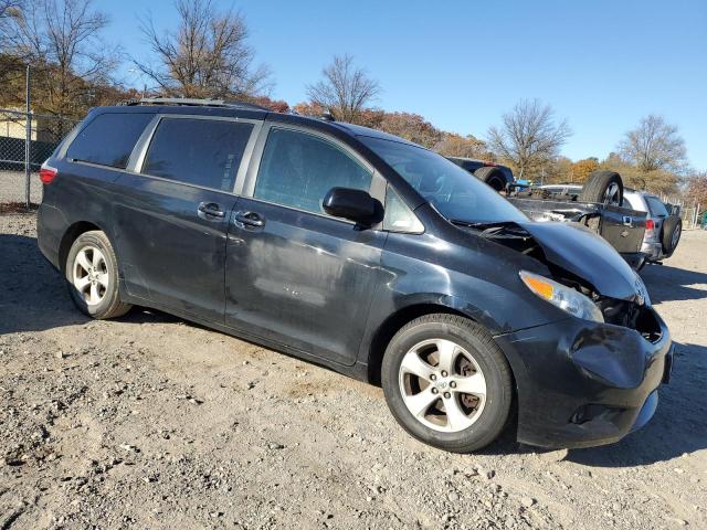 Photo 4 from auction – 2015 TOYOTA SIENNA LE with VIN 5TDKK3DC5FS658766