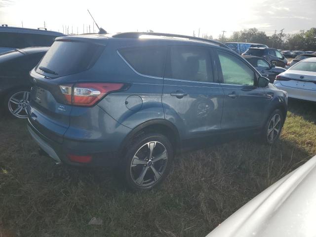 Photo 3 from auction – 2018 FORD ESCAPE SEL with VIN 1FMCU9HD2JUB97272