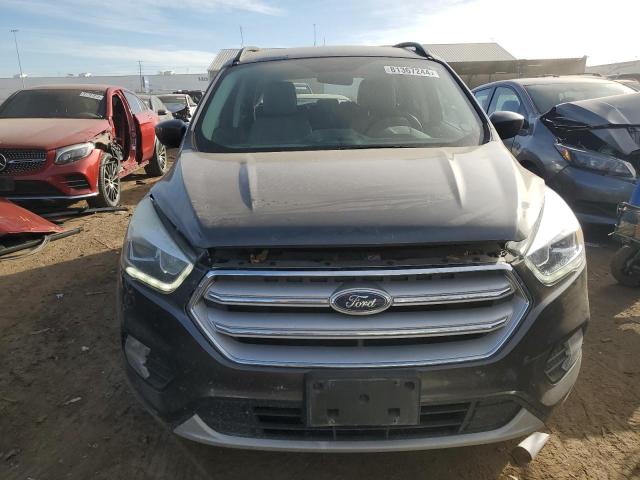 Photo 5 from auction – 2017 FORD ESCAPE SE with VIN 1FMCU9G99HUD96326