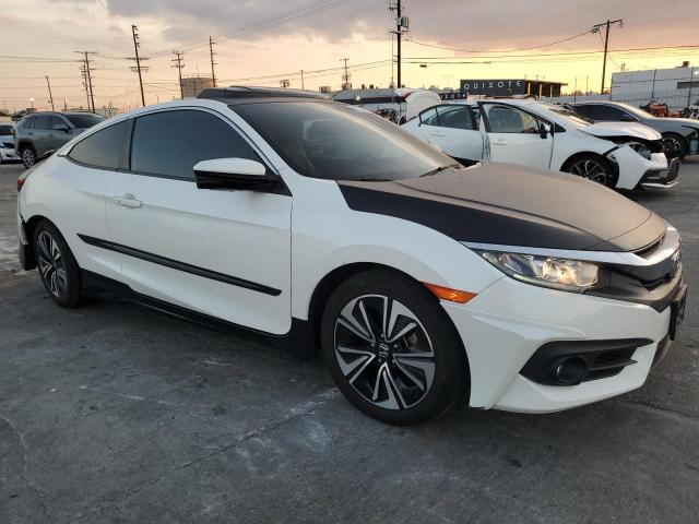 Photo 4 from auction – 2016 HONDA CIVIC EXL with VIN 2HGFC3B77GH362024