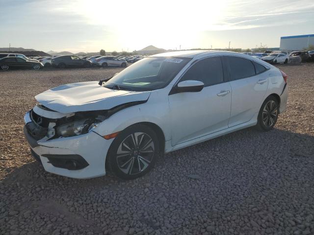 HONDA CIVIC EX 2017 with VIN 2HGFC1F33HH630385 - Photo from auction