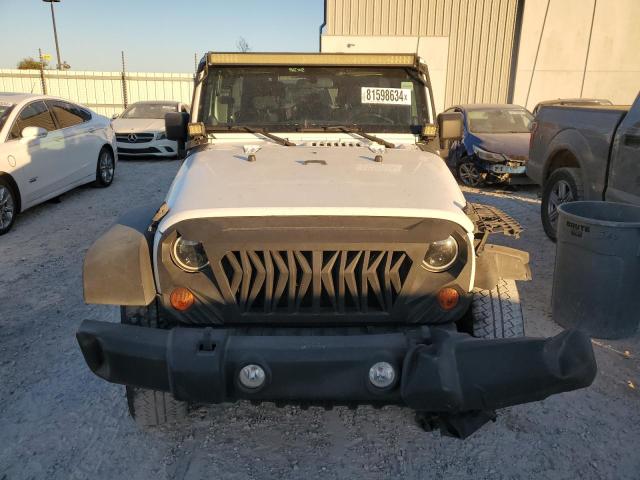 Photo 5 from auction – 2012 JEEP WRANGLER U with VIN 1C4BJWDG8CL132667