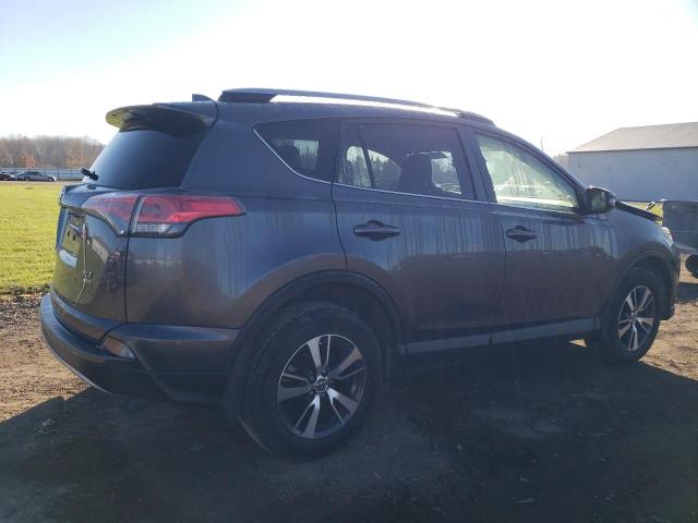 Photo 3 from auction – 2017 TOYOTA RAV4 XLE with VIN JTMRFREV2HD212207