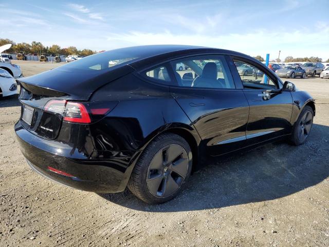 Photo 3 from auction – 2022 TESLA MODEL 3 with VIN 5YJ3E1EB3NF181666