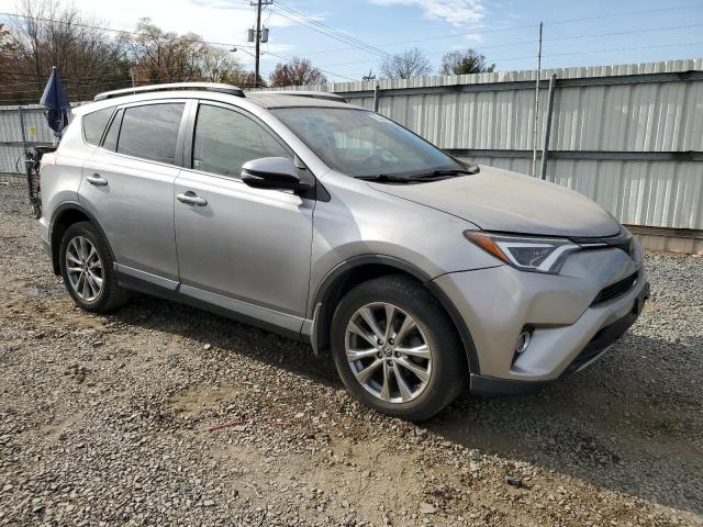 Photo 4 from auction – 2018 TOYOTA RAV4 LIMIT with VIN JTMDFREV7JD231495