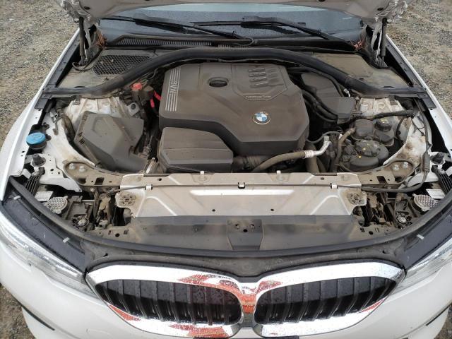 Photo 11 from auction – 2021 BMW 330I with VIN 3MW5R1J00M8C03771