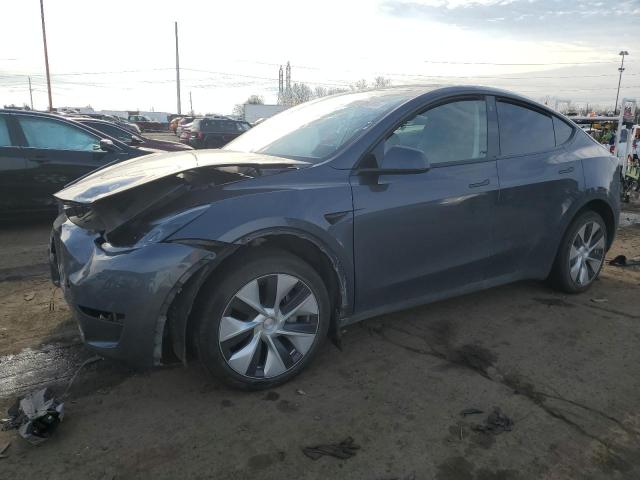 TESLA MODEL Y 2023 with VIN 7SAYGDEE1PF700490 - Photo from auction