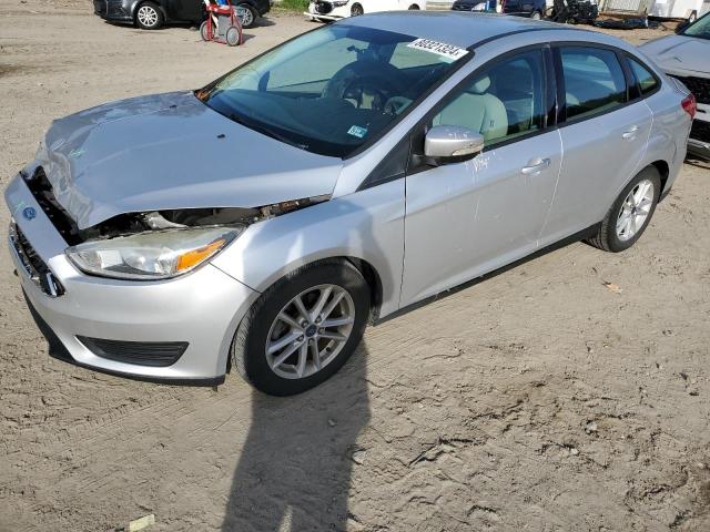 FORD FOCUS SE 2015 with VIN 1FADP3F21FL286462 - Photo from auction