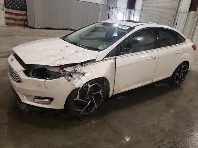 FORD FOCUS TITA 2015 with VIN 1FADP3J28FL221552 - Photo from auction