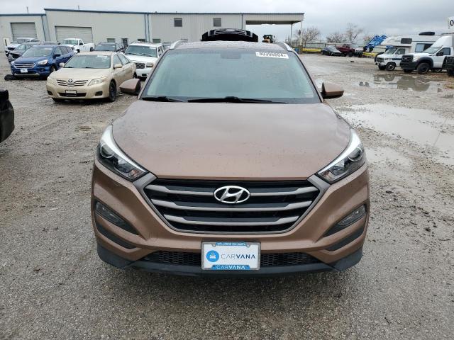 Photo 5 from auction – 2016 HYUNDAI TUCSON LIM with VIN KM8J33A44GU159634