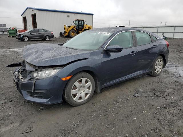 HONDA CIVIC EX 2018 with VIN 2HGFC2F77JH599625 - Photo from auction