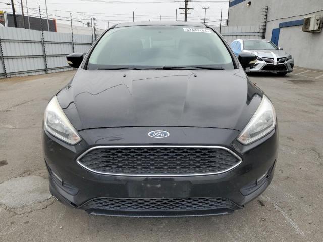 Photo 5 from auction – 2015 FORD FOCUS SE with VIN 1FADP3K2XFL385724