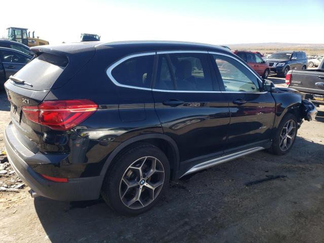 Photo 3 from auction – 2018 BMW X1 XDRIVE2 with VIN WBXHT3C36J5K26052