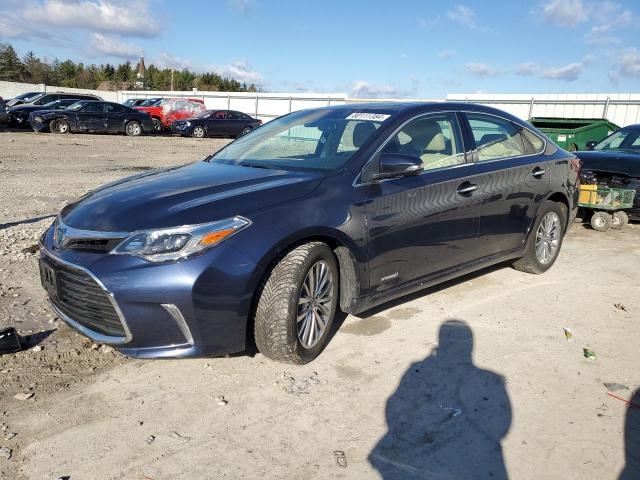 TOYOTA AVALON HYB 2018 with VIN 4T1BD1EB9JU061799 - Photo from auction