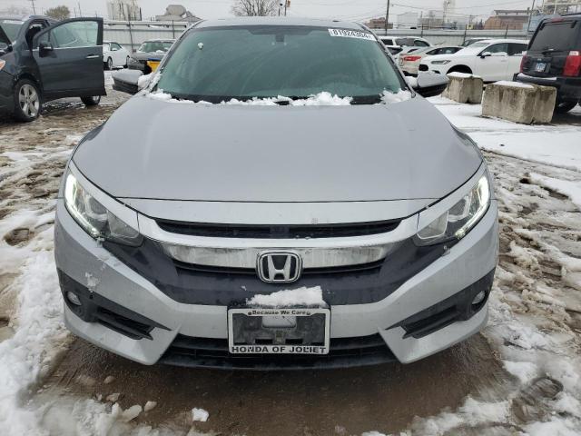 Photo 5 from auction – 2017 HONDA CIVIC with VIN 19XFC1F33HE014583