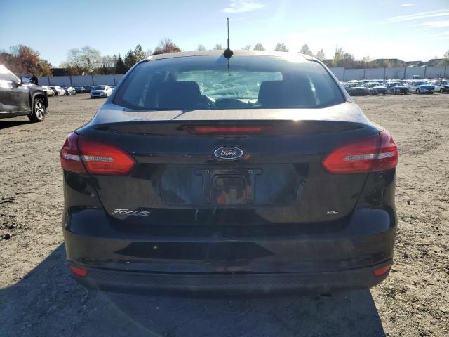 Photo 6 from auction – 2018 FORD FOCUS SE with VIN 1FADP3FE3JL289320