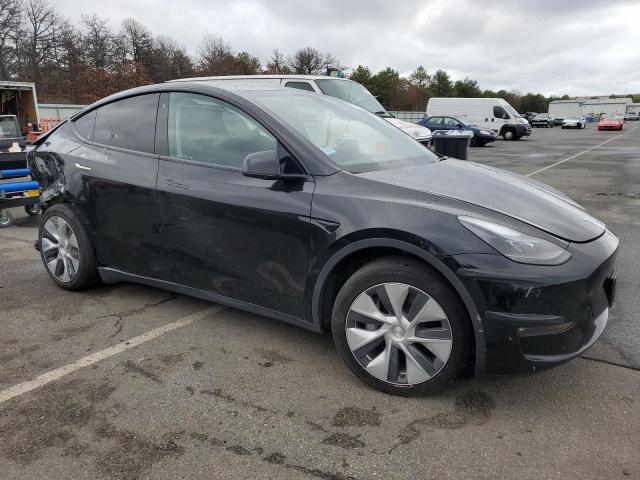 Photo 4 from auction – 2022 TESLA MODEL Y with VIN 7SAYGAEE2NF524559