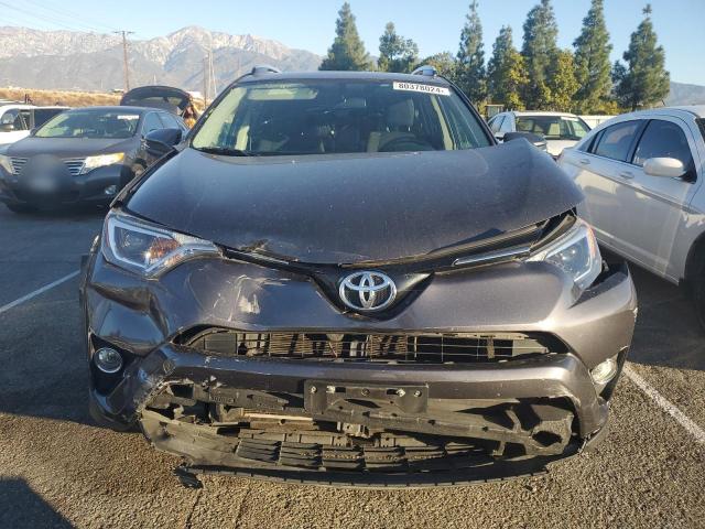 Photo 5 from auction – 2016 TOYOTA RAV4 XLE with VIN JTMWFREVXGJ074659
