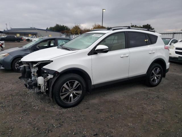 TOYOTA RAV4 XLE 2017 with VIN JTMWFREV2HD102812 - Photo from auction