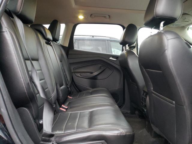Photo 11 from auction – 2016 FORD ESCAPE TIT with VIN 1FMCU9JX8GUC48593