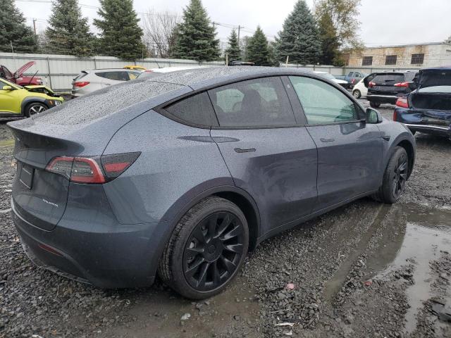 Photo 3 from auction – 2023 TESLA MODEL Y with VIN 7SAYGDEE8PA045306