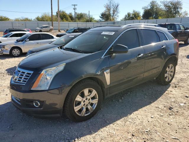 CADILLAC SRX PERFOR 2013 with VIN 3GYFNDE33DS594890 - Photo from auction