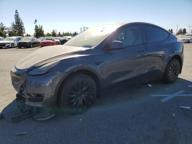 TESLA MODEL Y 2023 with VIN 7SAYGDEE9PF637283 - Photo from auction