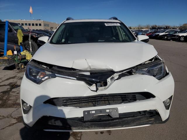 Photo 5 from auction – 2016 TOYOTA RAV4 XLE with VIN JTMRFREV0GJ101851