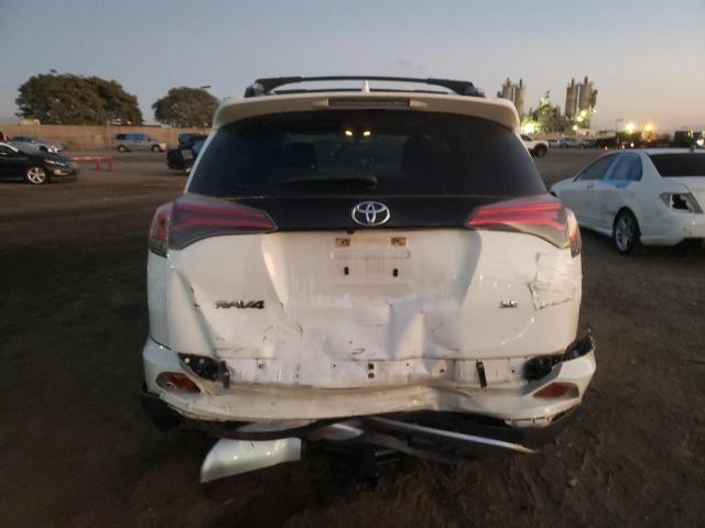 Photo 6 from auction – 2016 TOYOTA RAV4 SE with VIN JTMNFREV9GJ073112