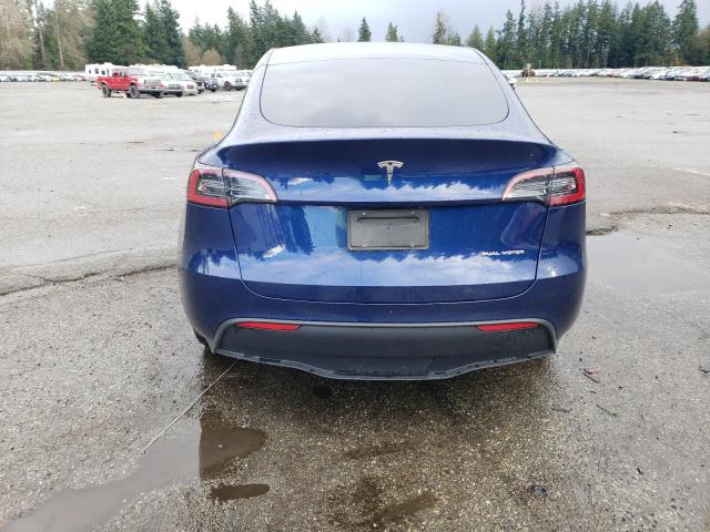Photo 6 from auction – 2023 TESLA MODEL Y with VIN 7SAYGAEE6PF880192