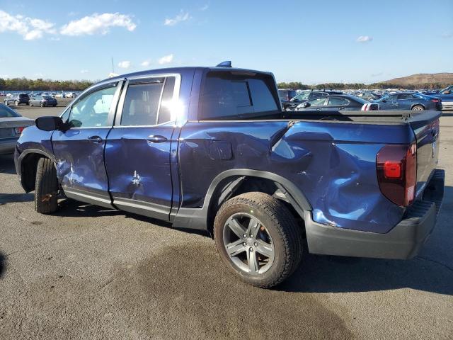 Photo 2 from auction – 2023 HONDA RIDGELINE with VIN 5FPYK3F56PB052883
