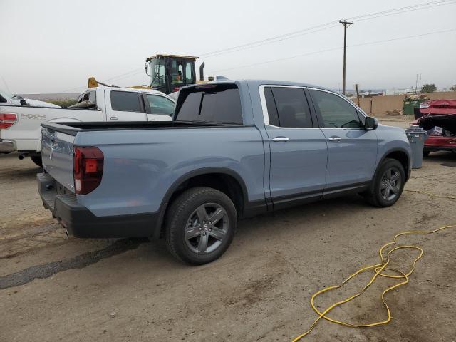 Photo 3 from auction – 2023 HONDA RIDGELINE with VIN 5FPYK3F77PB042820