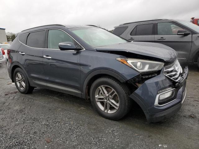 Photo 4 from auction – 2017 HYUNDAI SANTA FE S with VIN 5NMZU3LB9HH045475