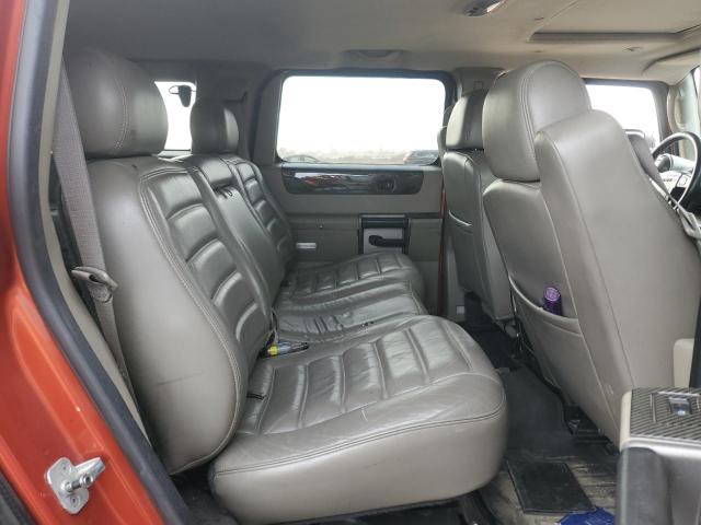 Фото 11 с аукциона – 2003 HUMMER H2 с VIN 5GRGN23UX3H122282