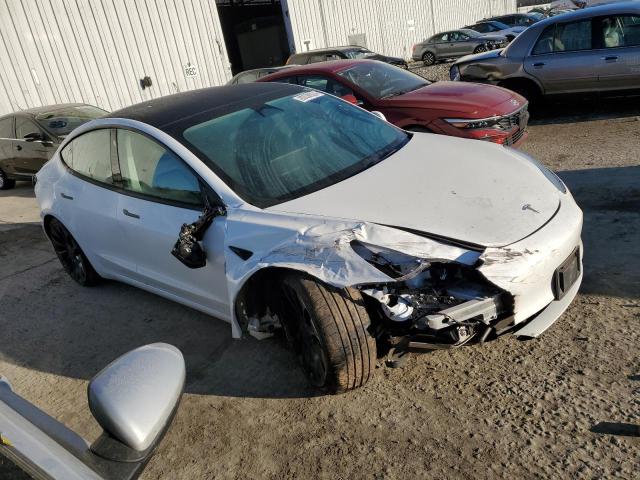 Photo 4 from auction – 2023 TESLA MODEL 3 with VIN 5YJ3E1EC7PF428389