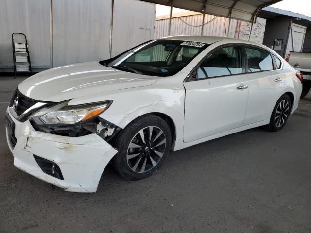 NISSAN ALTIMA 2.5 2018 with VIN 1N4AL3AP4JC266071 - Photo from auction