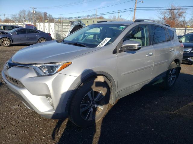 TOYOTA RAV4 XLE 2016 with VIN 2T3RFREV4GW460945 - Photo from auction