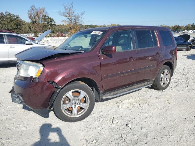 HONDA PILOT EXL 2012 with VIN 5FNYF4H52CB038974 - Photo from auction