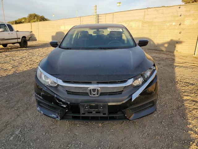 Photo 5 from auction – 2018 HONDA CIVIC LX with VIN 2HGFC2F53JH519557