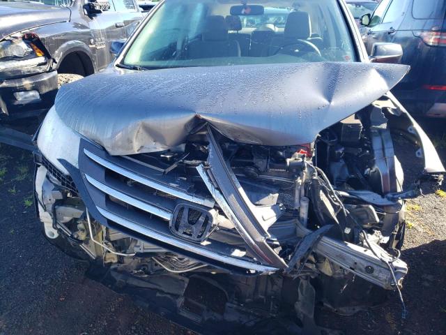 Photo 12 from auction – 2014 HONDA CR-V LX with VIN 3CZRM3H35EG713467