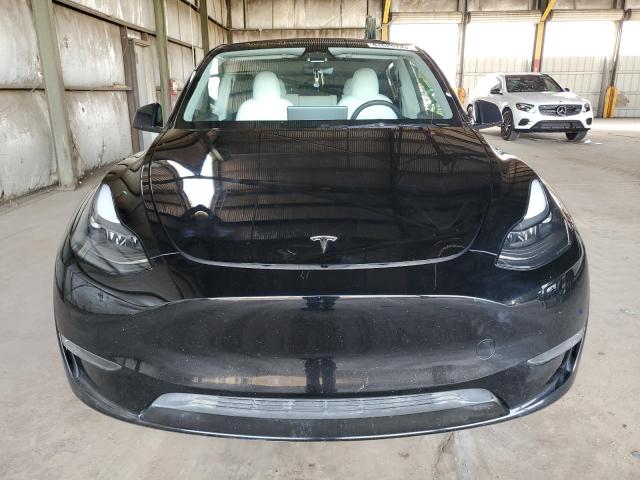 Photo 5 from auction – 2023 TESLA MODEL Y with VIN 7SAYGAEE8PF644661