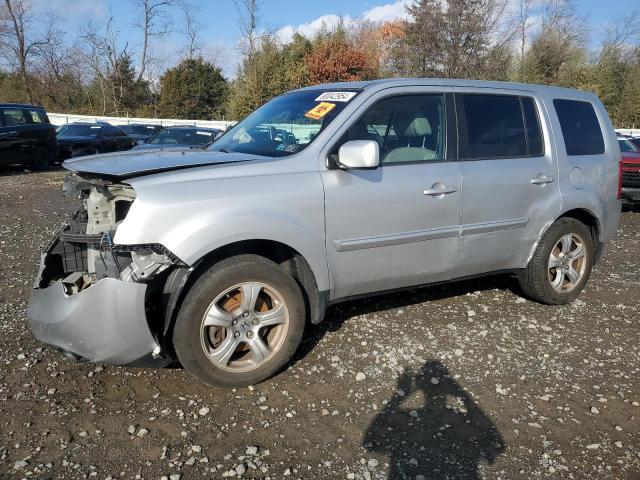 HONDA PILOT EXL 2012 with VIN 5FNYF4H51CB075918 - Photo from auction