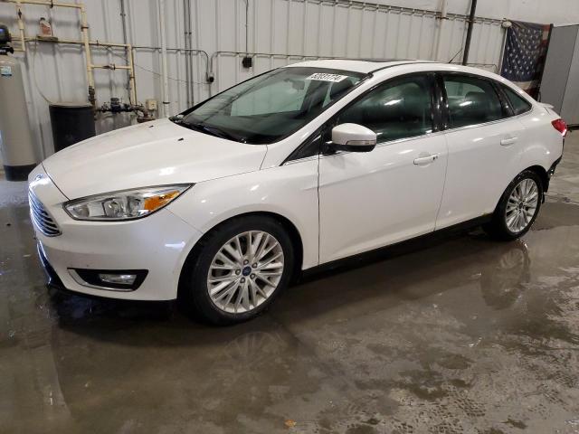 FORD FOCUS TITA 2015 with VIN 1FADP3J20FL324254 - Photo from auction