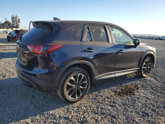 Photo 3 from auction – 2016 MAZDA CX-5 GT with VIN JM3KE2DY5G0685779