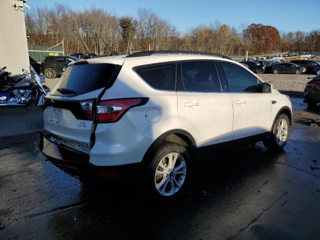 Photo 3 from auction – 2018 FORD ESCAPE SE with VIN 1FMCU9GD6JUD56165