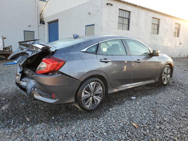Photo 3 from auction – 2018 HONDA CIVIC EX with VIN JHMFC1F42JX030951