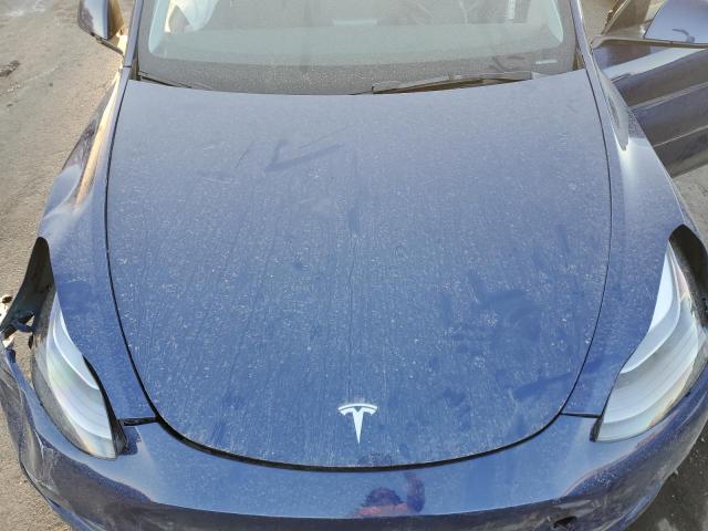 Photo 12 from auction – 2023 TESLA MODEL Y with VIN 7SAYGDEE2PA193399