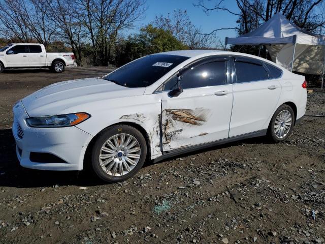 FORD FUSION S H 2016 with VIN 3FA6P0UU0GR348917 - Photo from auction