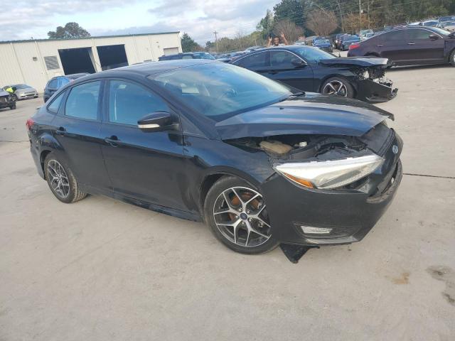 Photo 4 from auction – 2015 FORD FOCUS SE with VIN 1FADP3F26FL311369